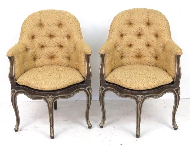 Pair LOUIS XV STYLE CUSTOM CARVED BERGERES: Walnut with gilt carvings and caned seats. 36"h. x 25 1/2"w. x 26 1/2"d.