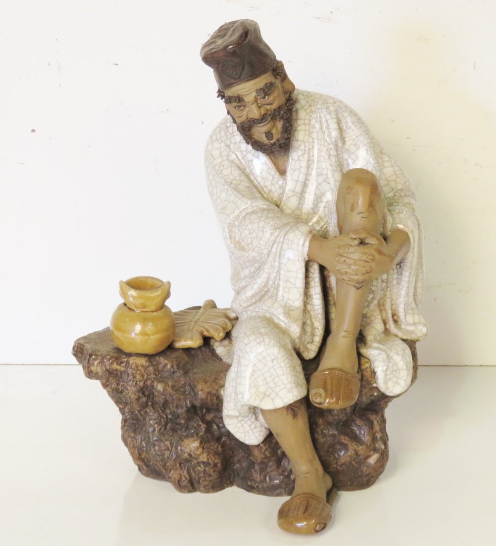 ASIAN CERAMIC FIGURE on ROCK (1 of 7)