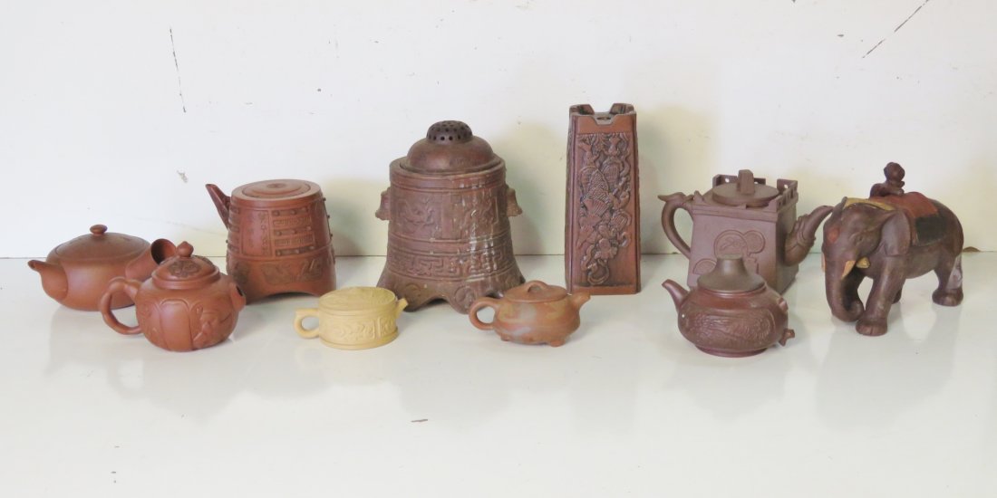 10 ASIAN TEAPOTS & DECORATIVE OBJECTS: Asian teapots and decorative objects. 8"h.