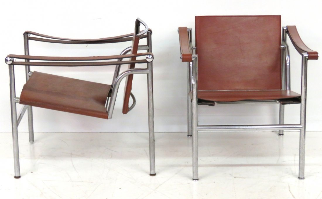 PAIR CASSINA CHROME & LEATHER ARMCHAIRS: Chrome with leather. 27"h x 25"w x 25 1/2"d