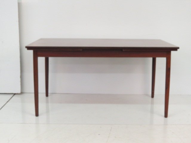 DANISH MODERN ROSEWOOD DINING TABLE after ARNE VODDER: Rosewood with drawer leaves. 29"h. x 59 1/4"w. x 37 1/4"d. Two 21 1/2" boards.