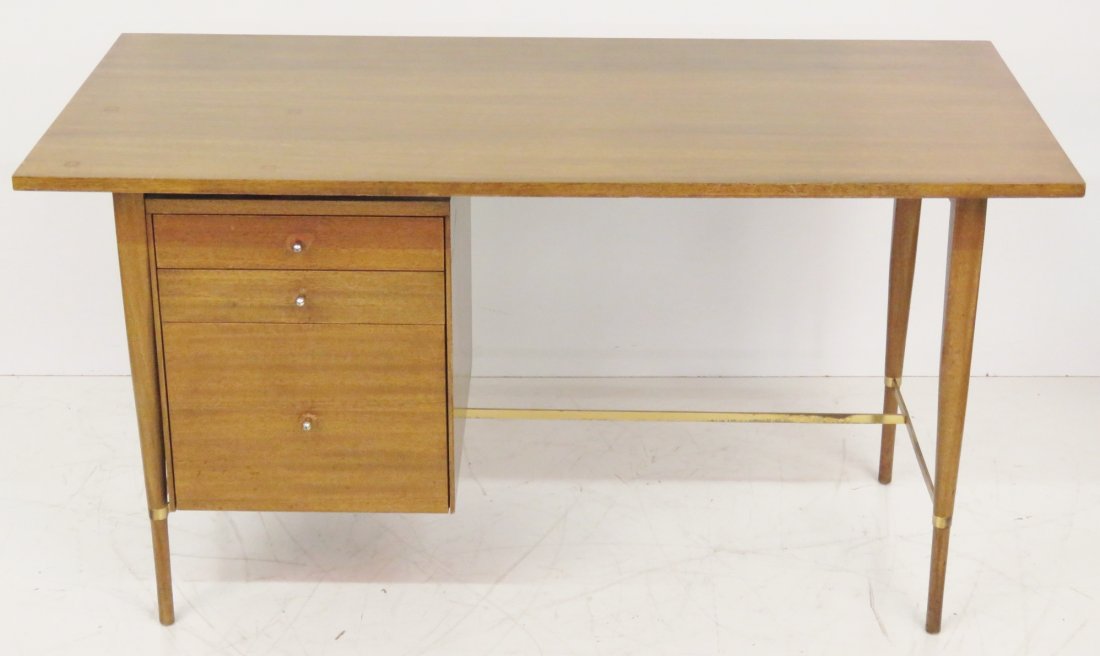 PAUL McCOBB BRASS STRETCHER DESK: Mahogany with brass stretcher. 29"h. x 54"w. x 26 1/8"d.