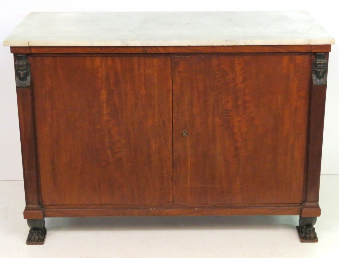 ANTIQUE FRENCH RETOUR D'EGYPTE COMMODE: Fitted interior with drawers. Marble top. 36 1/2"h. x 53"w. x 24 1/2"d.