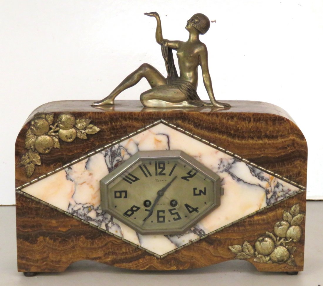 ART DECO MARBLE CLOCK w/ METAL FIGURE: Brown and pink marble. Silvered metal figure of nude dancer. 16"h. x 16 1/2"w. x 4"d.