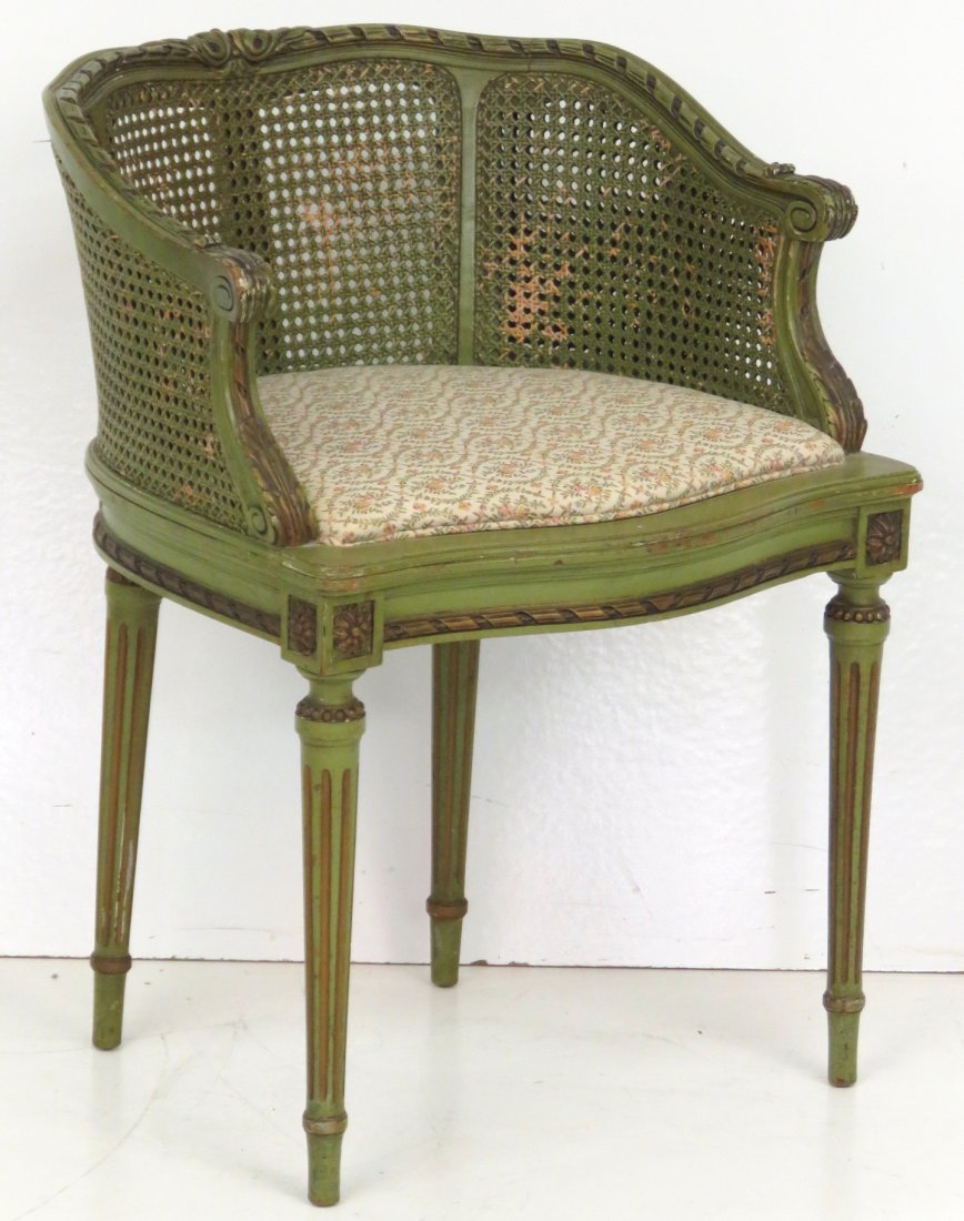 ANTIQUE LOUIS XVI STYLE GREEN PAINTED & CARVED VANITY: Distressed green paint with gilt carvings. Caned sides and back. 28''h. x 20''w. x 20''d.