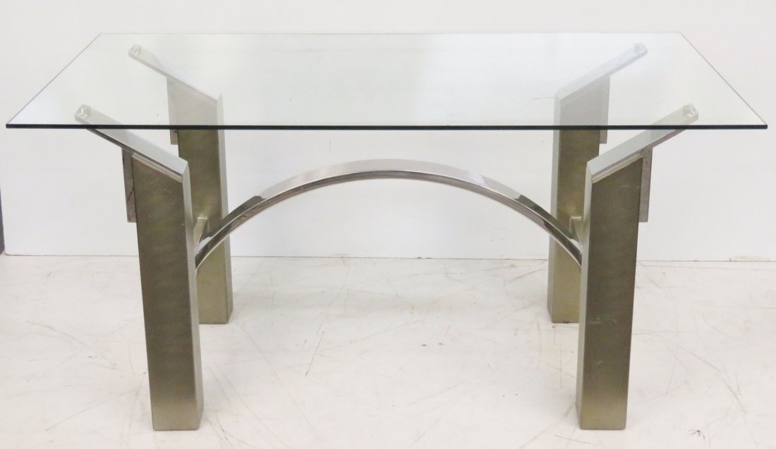 BRUETON ARQUITECTURA TABLE by SERGIO OROZCO: Chrome and brushed metal base. Glass top. 29"h. x 57 3/4"w. x 30"d.