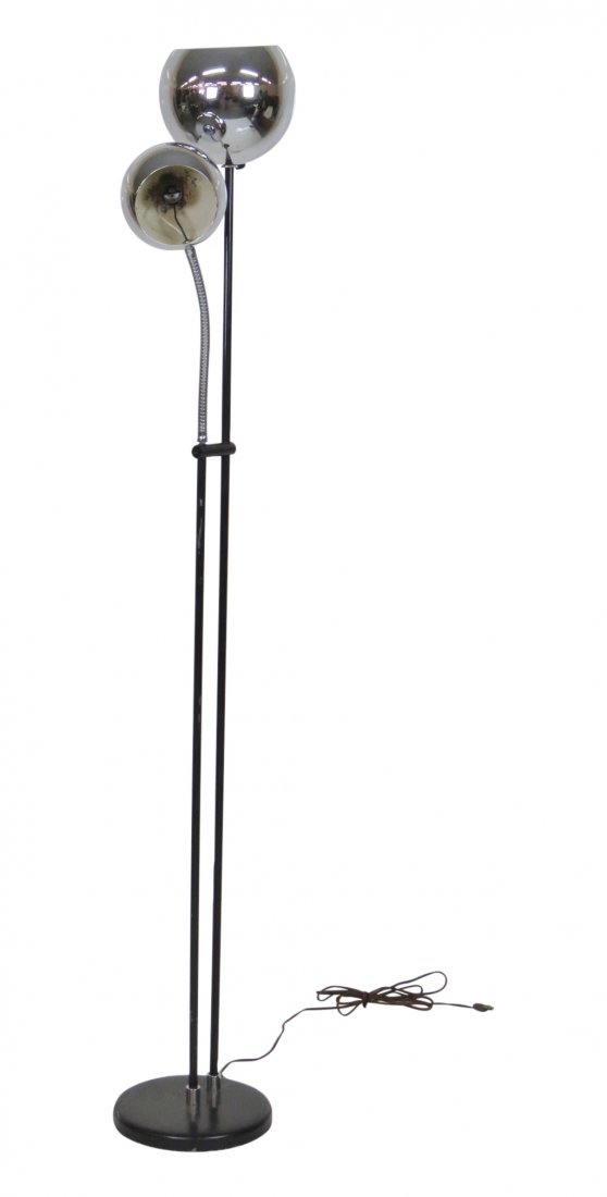 RAYMOR CHROME & BLACK METAL FLOOR LAMP: Black painted metal with one chrome adjustable light and one torchiere. 64 1/2"h.