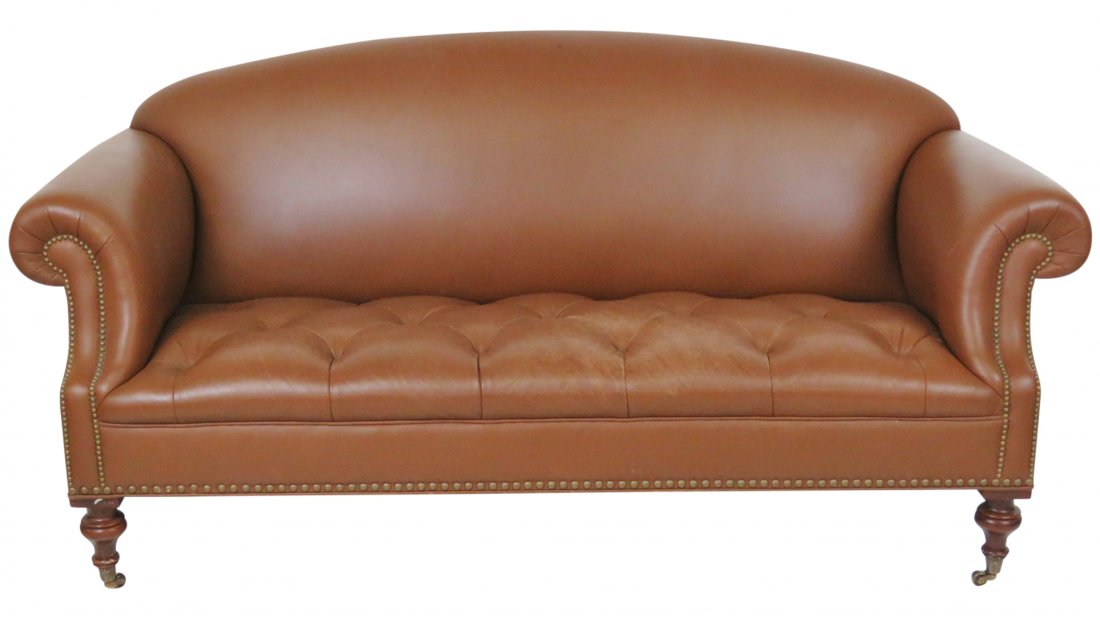 BROWN TUFTED LEATHER SOFA: Brown tufted leather. 36 1/4"h. x 76"w. x 37"d.