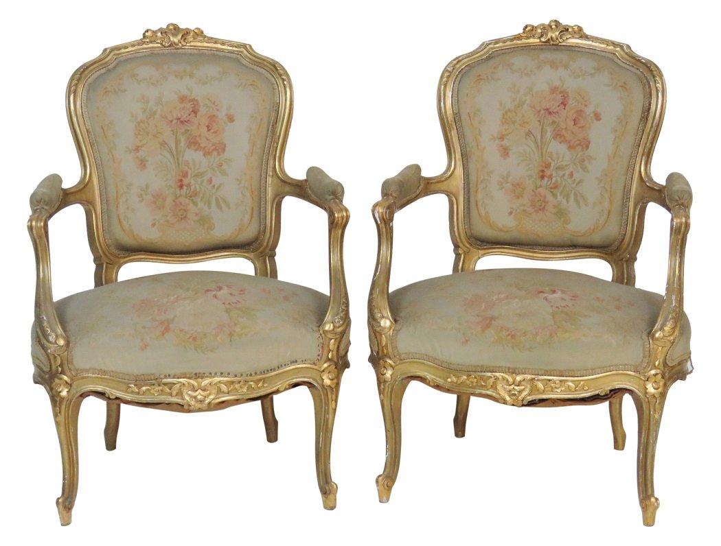 Pair LOUIS XVI STYLE GILT CARVED AUBUSSON FAUTEUILS: Gilt painted carved frame. Aubusson upholstery. 38"h. x 28"w. x 23"d.
