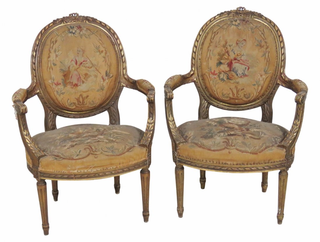 Pair LOUIS XVI STYLE CARVED AUBUSSON FAUTEUILS: Aubusson upholstery with boys and birds. 37 1/2"h. x 26"w. x 23"d.