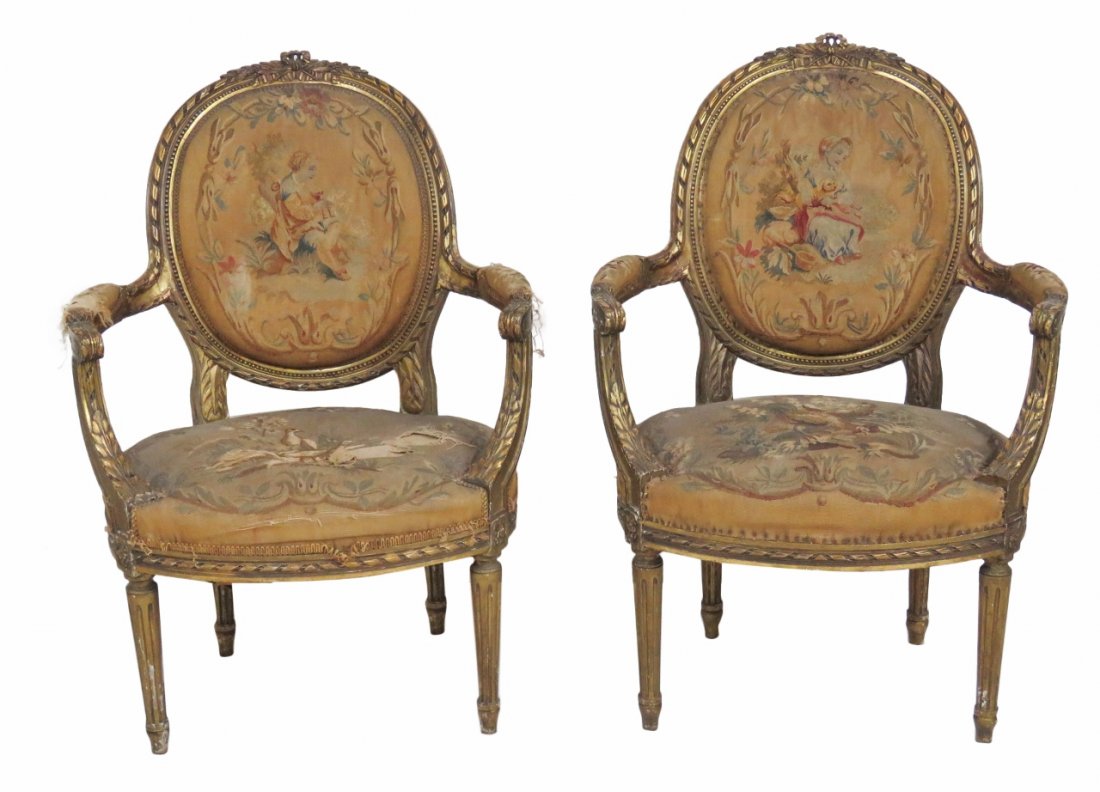 Pair LOUIS XVI STYLE CARVED AUBUSSON FAUTEUILS: Aubusson upholstery with boys and birds. 37 1/2"h. x 26"w. x 23"d.