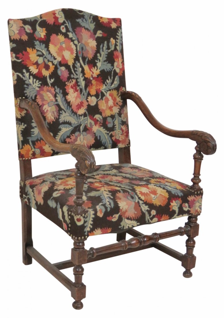 CARVED WALNUT NEEDLEPOINT THROWN CHAIR: Carved walnut frame. Needlepoint upholstery. 45 1/2"h. x 26 1/4"w. x 26"d.