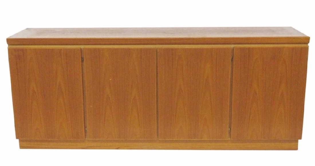 SKOVBY MOBELFABRIK DANISH MODERN TEAK SIDEBOARD: Teak frame with four doors and shelves. 32 1/2"h. x 80 1/4"w. x 19"d.