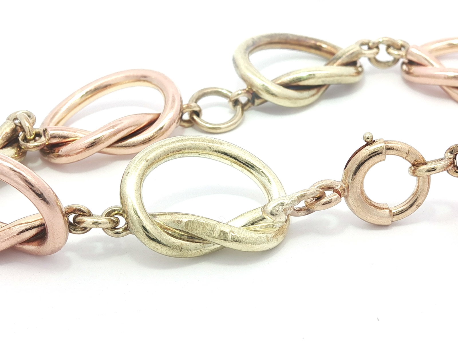 Tiffany & Co. 14k Rose & Green Gold Open Knot Bracelet: Vintage Retro Tiffany & Co. 14k Rose & Green Gold Open Knot Link Bracelet Material: Solid 14k Rose & Green Gold Weight: 28.27 GramsType: Open Knot LinkLength: 7.5? (measured on ruler) can comfortably
