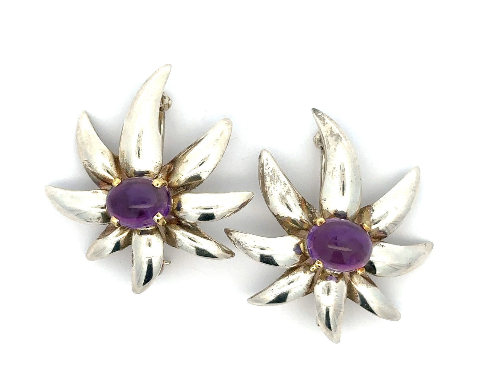 Tiffany & Co. Silver & Gold Amethyst 2 Fireworks Brooch: Tiffany & Co. Silver & Gold Cabochon Amethyst Pair of 2 Fireworks Pin Brooch ?Stone(s)?(2) Natural Genuine Amethyst - Oval Cabochon Cut - Prong Set - Purple Color - 8.8x7mm each (approx.)Material: Ste