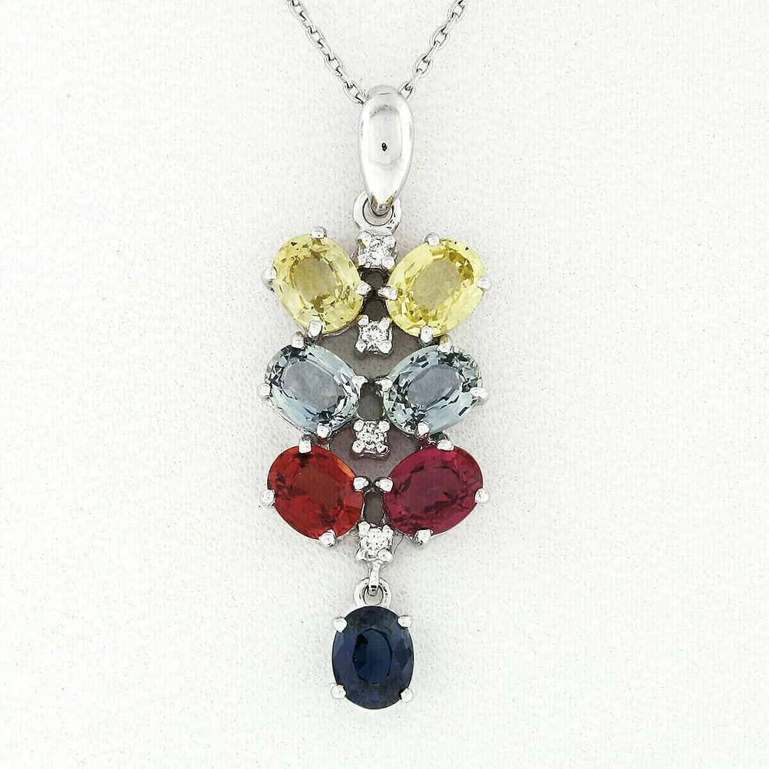 14K Gold Sapphire & Diamond Pendant Necklace: 14K White Gold 3.54ctw Multi-Color Sapphire & Diamond Dangle Pendant Necklace. You are looking at a unique pendant necklace crafted in solid 14k white gold featuring multi-colored sapphires and