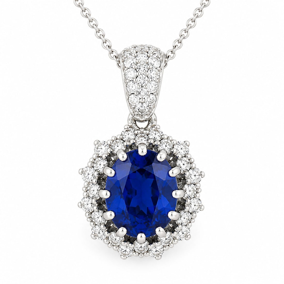 New 14k Gold Tanzanite & Diamond Dual Halo Pendant: New 14k White Gold 2.59ctw Oval Tanzanite & Diamond Dual Halo Pendant w/ Chain. This brand new, tanzanite and diamond pendant is crafted in solid 14k white gold. It features a large, approximately