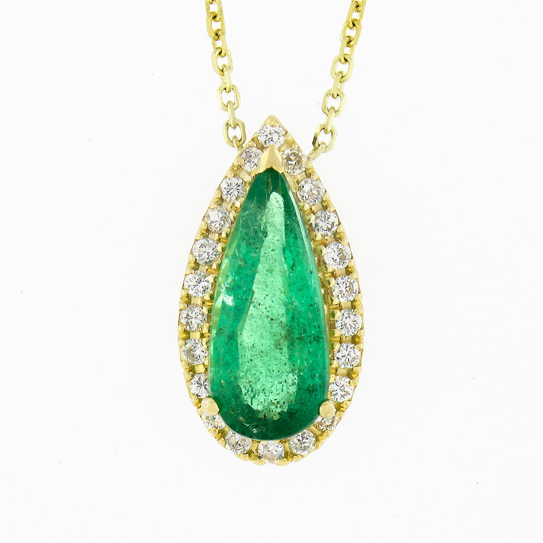 18K Gold Pear Emerald w/ Diamond Halo Teardrop Pendant: 18K Gold 2.15ct Elongated Pear Emerald w/ Diamond Halo Teardrop Pendant Necklace. This gorgeous pendant necklace is crafted in solid 18k yellow gold and features an elongated tear drop design set