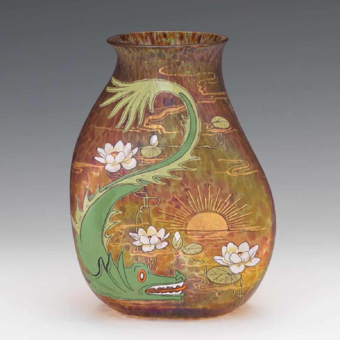 An Enameled and Parcel Gilt Bohemian Glass Vase: Oil spill design base with dimpled sides; decorated on the front with a stylized green dragon, water lilies and a sunset; of Bohemian manufacture, possibly Loetz SIZE: 5 1/2" dia. x 7 1/2" H CONDITION