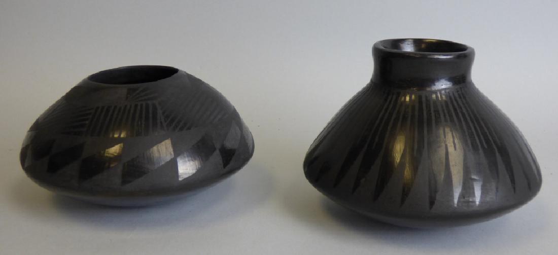 Lot of 2 Southwestern Blackware Pottery Vases: Size : 3 1/4" H x 4 1/2" dia. on largest piece.