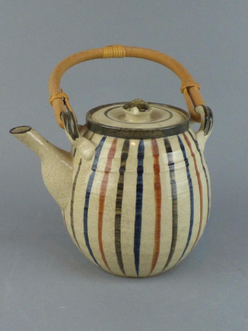 Striped Teapot with Bamboo Handle: 9.5" H x 7.5" L x 5."W