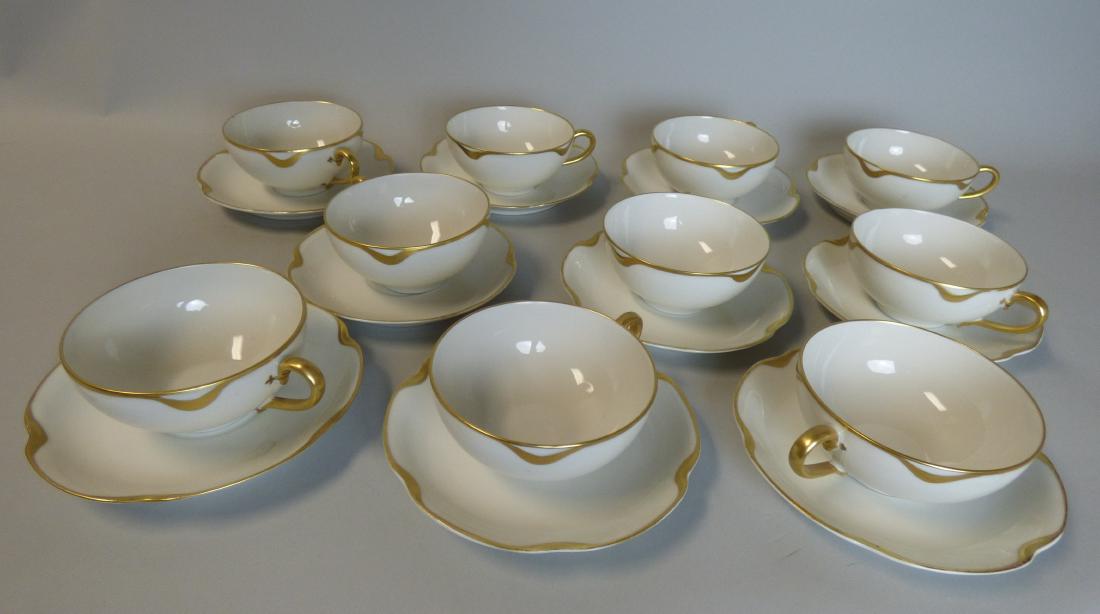 Ten Haviland Limoges Porcelain Cups & Saucers: Five each, ten (10) pieces in total. Size: 4 1/2" L x 3 3/4" W x 1 3/4" H (cups); 5 1/4" dia. (saucers)