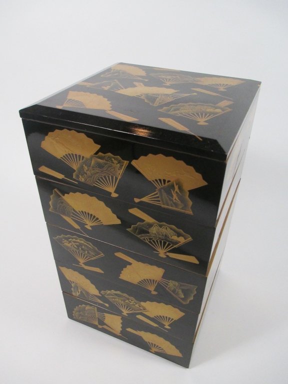 Antique Japanese Lacquer & Gold Maki-e Jubako: Comprising four segments, each finely decorated in gold maki-e to depict fans with various motifs, the interior cover with cranes motif; each segment further decorated throughout the interior with gol