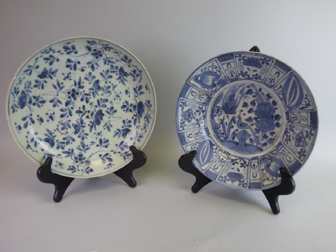 Two Antique Chinese Blue & White Porcelain Bowls: Size (largest): 2 1/2" H x 11 1/2" dia. CONDITION REPORT: Larger with chip at one side; smaller with significant prior repair
