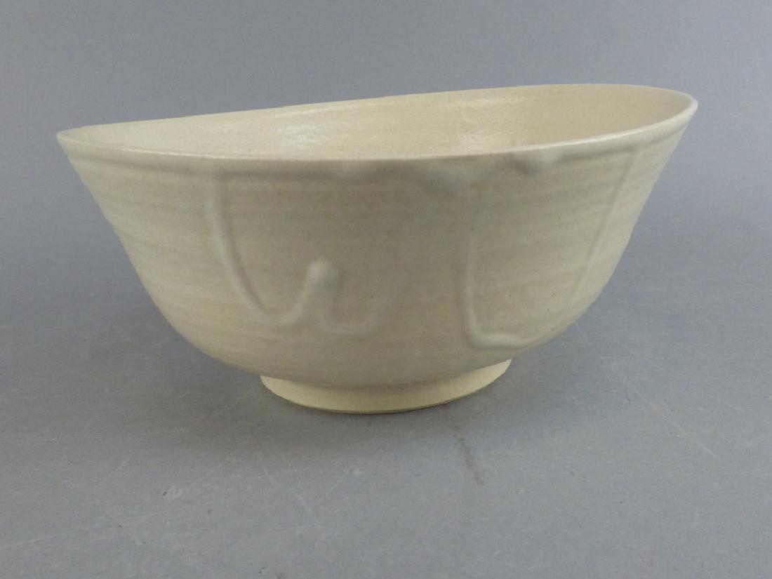 White Pottery Bowl: 7.5" L x 7" W x 3.25" H THIN