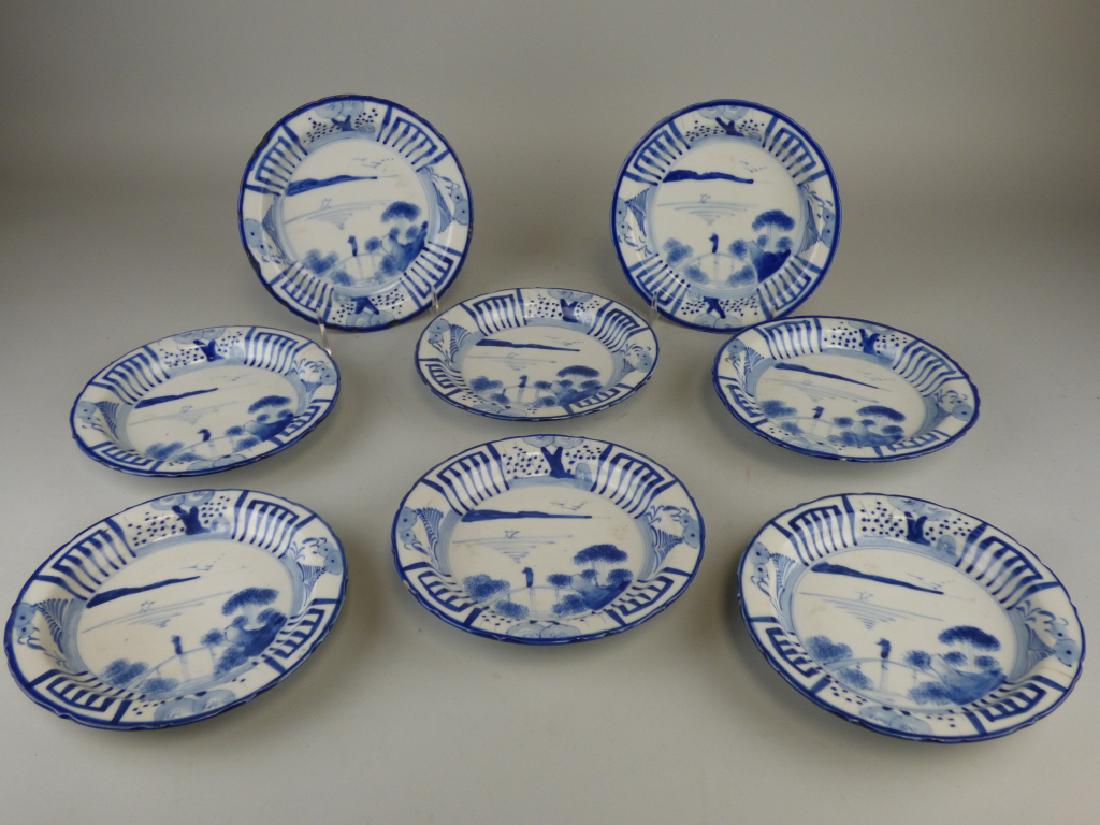 8 Blue & White Plates: Hairline Cracks to 2 Bowls, Chips to Bottom edges on 4 bowls .Signed to Base 7" Dia