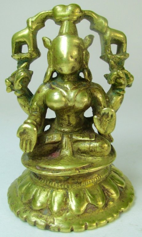 An Antique Nepalese Bronze Avalokitesvara Figure: An antique Nepal bronze Buddha statue, depicting a four-arm Avalokitesvara (Avalokiteshvara), possibly 11-13th century, face has rubbed (for blessing) to a smooth surface. Size: 3" H