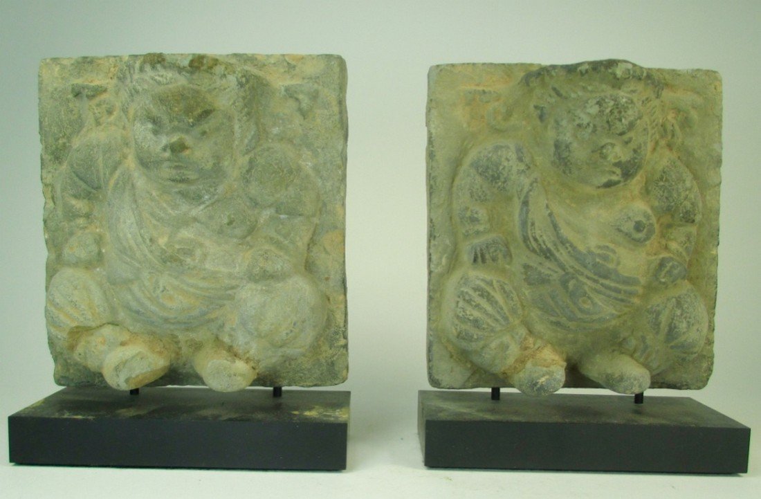 A pair of Chinese carving plaques (1 of 4)