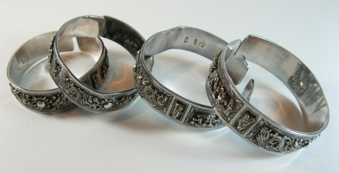 A Group of Four Chinese Sterling Silver Bangles (1 of 7)