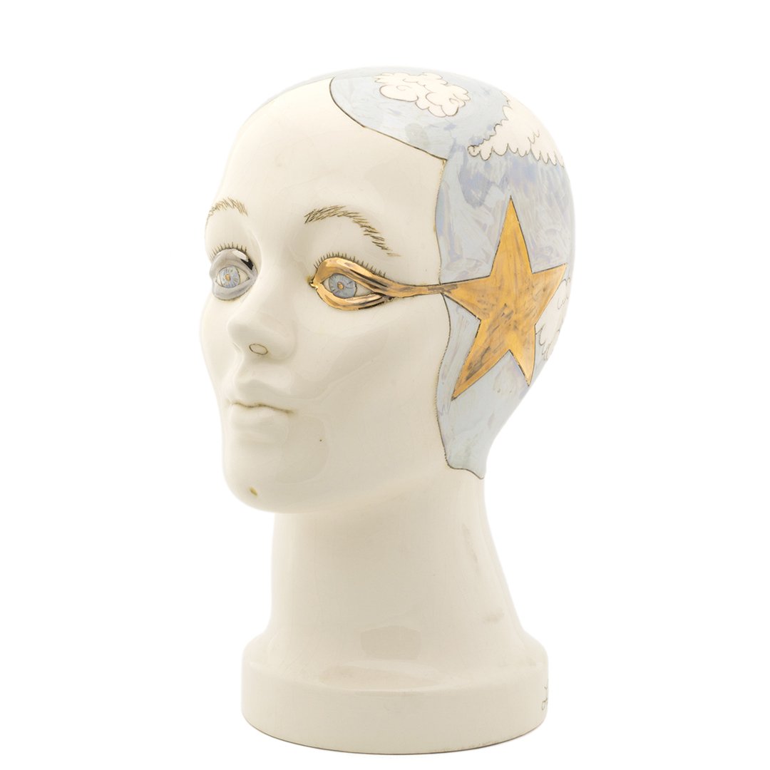 Lukman Glasgow Surrealist Head Sculpture: Porcelain surrealist head sculpture from the Celeb Baxis series by Lukman Glasgow, May 1974. Signed, dated and numbered: 39/50. 12" H X 6" W x 8" D.