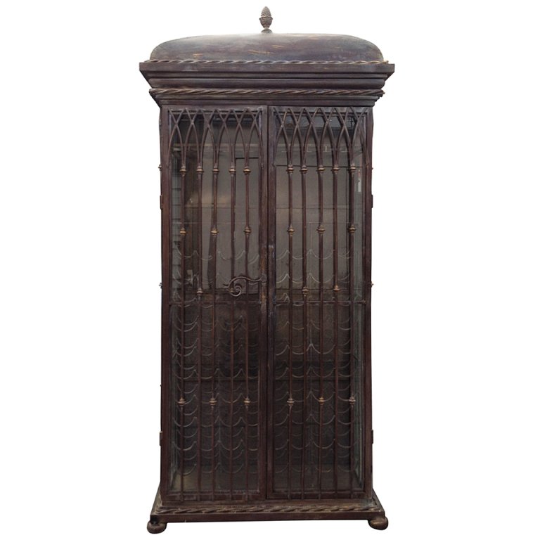 Tony Duquette Style Wine Cabinet: Large patinated steel wine cabinet in the style of Tony Duquette, 1950s.