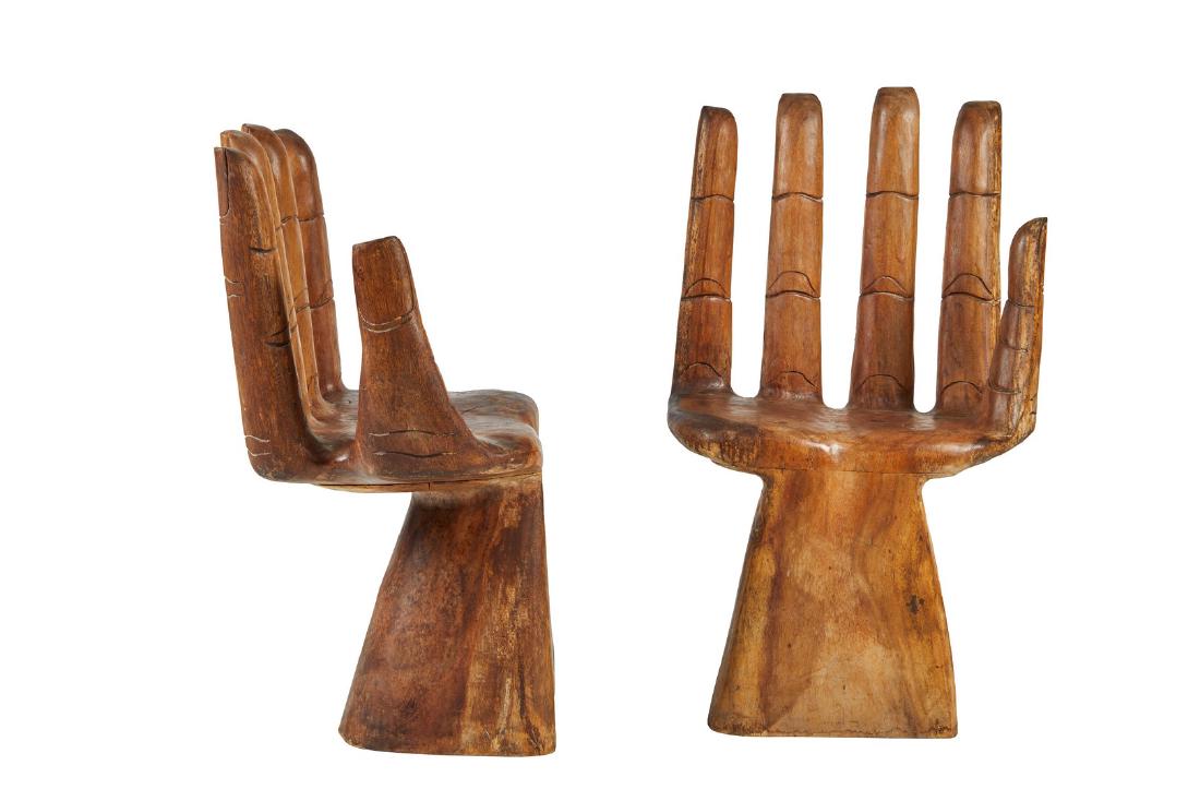 Pedro Friedeberg Style Carved Hand Chairs (2): Pair of carved hand chairs in the style of Pedro Friedeberg, Mexico 1970s. 36" H x 22" W x 17" D.