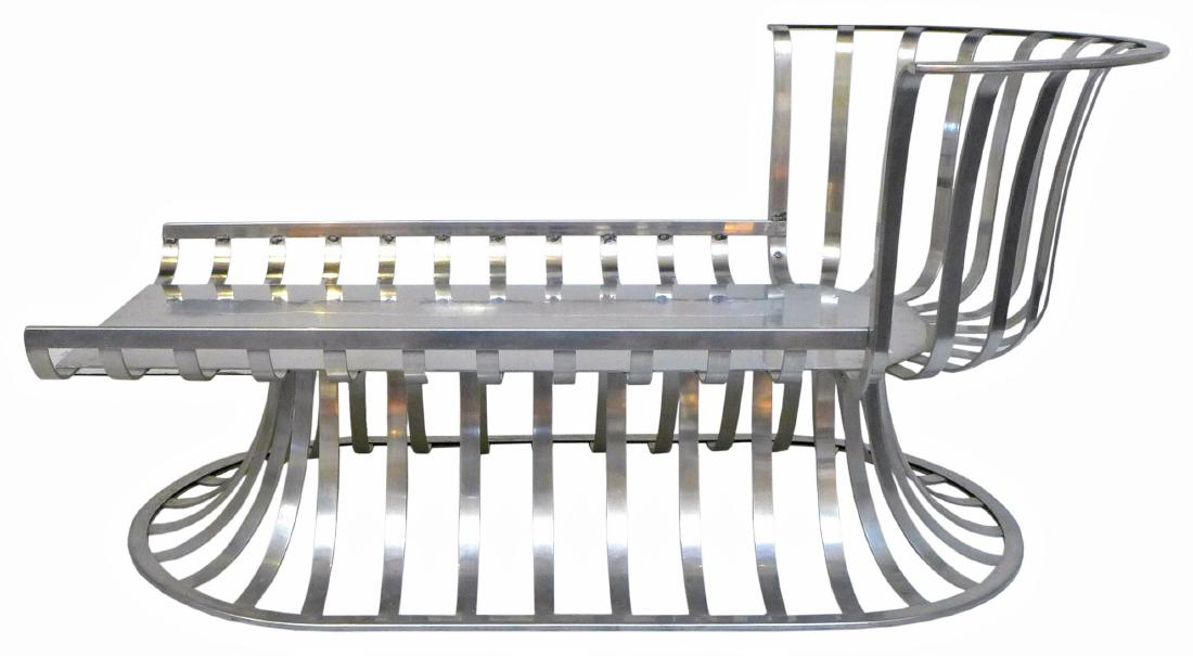 Russell Woodard Chaise Lounge: Polished aluminum chaise lounge by Russell Woodard, 1960s. 26" H x 54" W x 32" D.