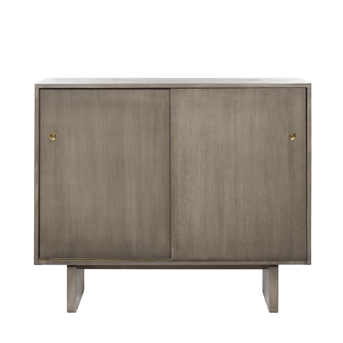 T.H. Robsjohn-Gibbings Cabinet: Sliding door gentleman's chest by T.H. Robsjohn-Gibbings for Widdicomb, 1950s. 43" H x 51 1/2" W x 18 1/2" D.