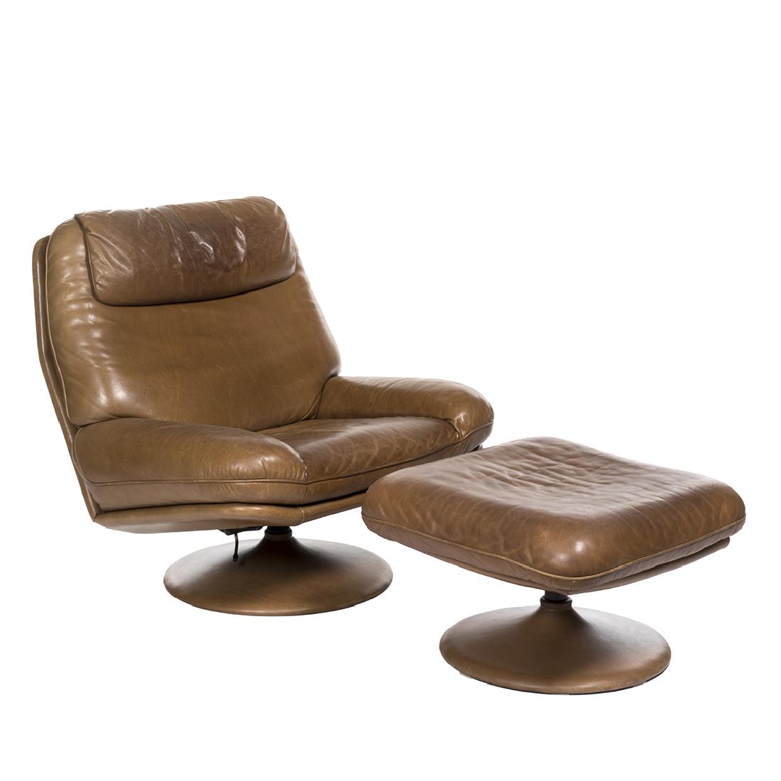 de Sede Lounge Chair and Ottoman: Leather lounge chair and ottoman by de Sede, 1970s. Chair: 36" H x 36" H x 36" D. Ottoman: 16" H x 25" W x 25" D.