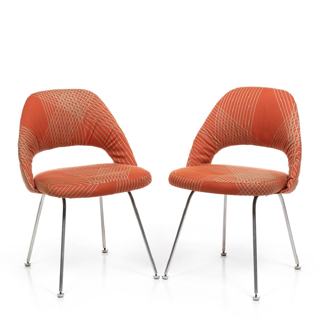 Eero Saarinen Executive Chairs: Pair of early production Executive chairs with aluminum base by Eero Saarinen for Knoll, 1950s. 32" H x 21" W x 19" D.