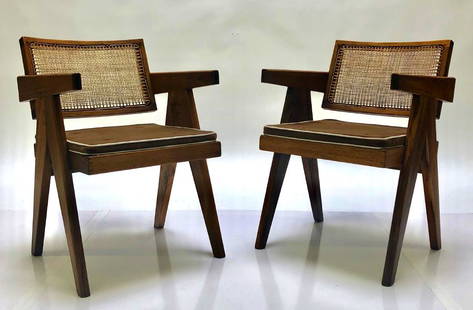 Pierre Jeanneret Armchairs (2): Pair of armchairs in teak and cane with original upholstered cushion, commissioned for the Himalayan Student Residence in Chandigarh by Pierre Jeanneret for Le Corbusier, 1955. Numbered. 32" H x 20"