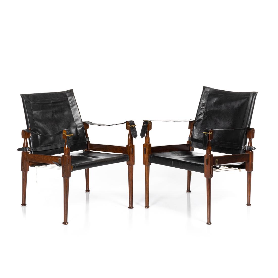 Kaare Klint Style Rosewood Safari Chairs: Pair of rosewood and leather safari chairs in the style of Kaare Klint, Denmark 1960s.