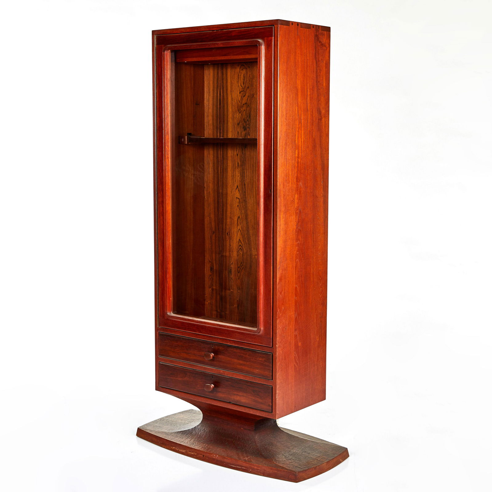 John Nyquist Gun Cabinet: Sculptural carved walnut gun cabinet with internal light source by John Nyquist, 2002.