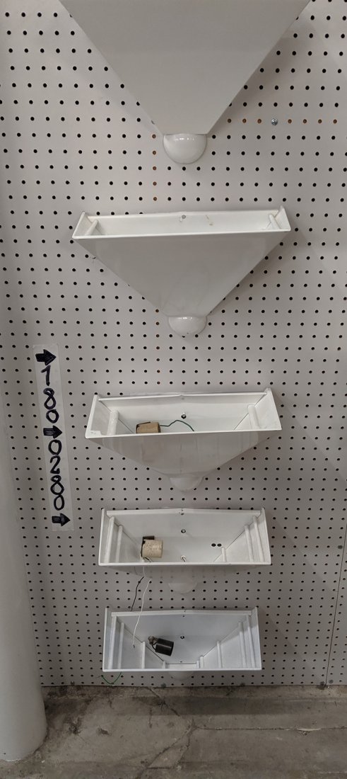 White Wall Sconces (8): Set of eight white metal uplight sconces.