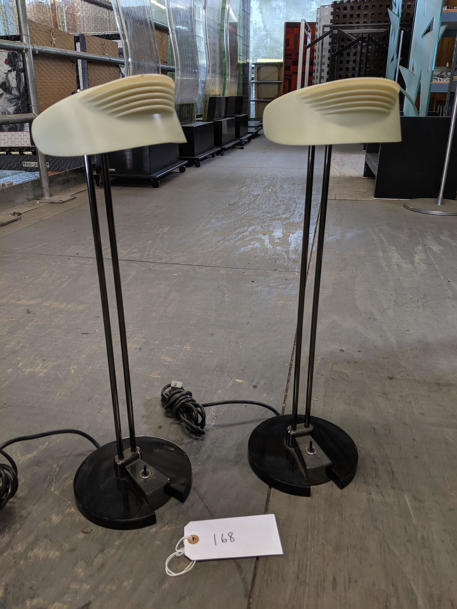 Arteluce Desk Lamps (2): Pair of Arteluce desk lamps.