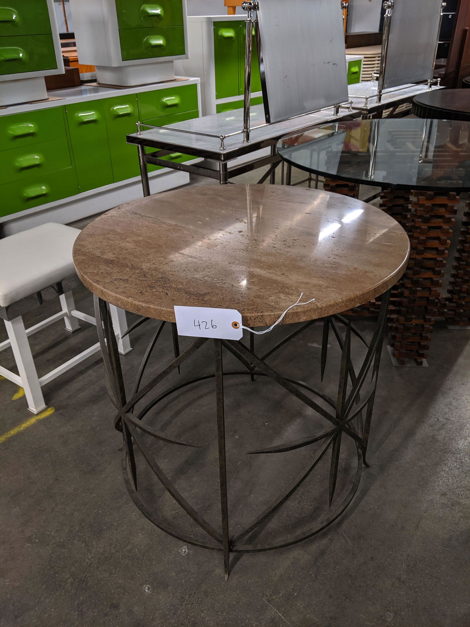Center Table: Round center table with travertine top.