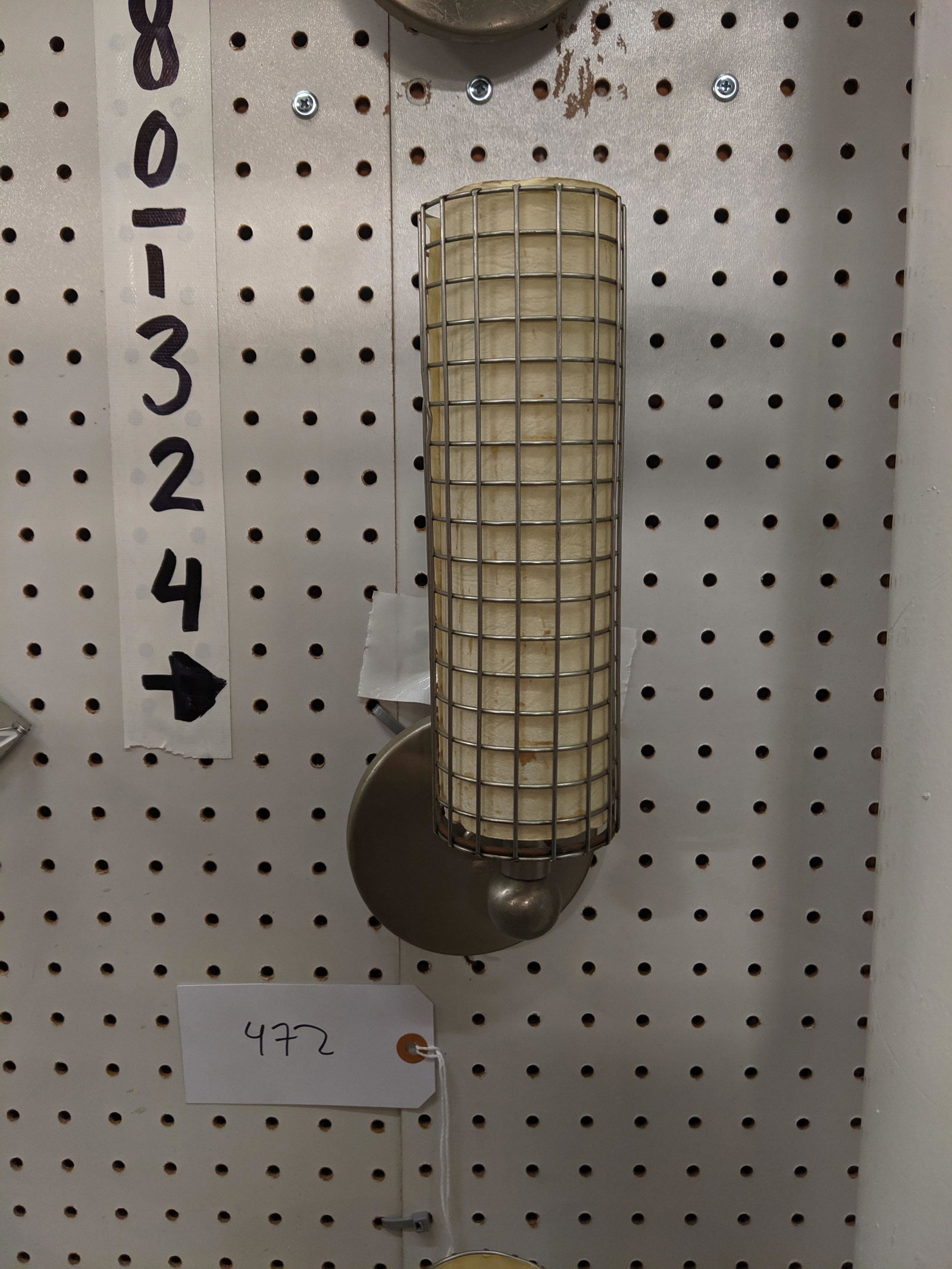 Cage Sconces (4): Set of four cylindrical wall sconce with cage shades.