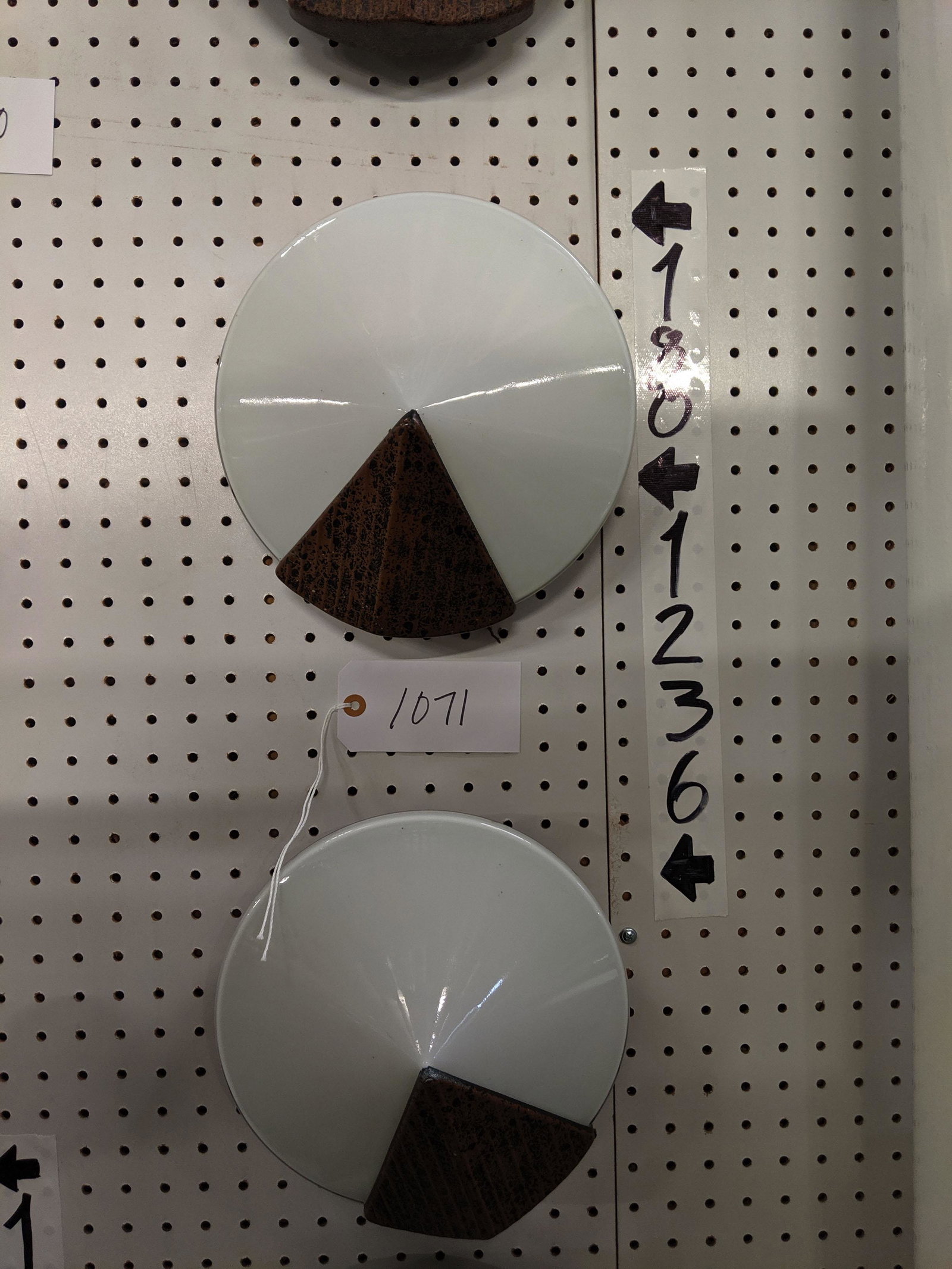 Round Wall Sconces: Set of 11 round glass wall sconces.