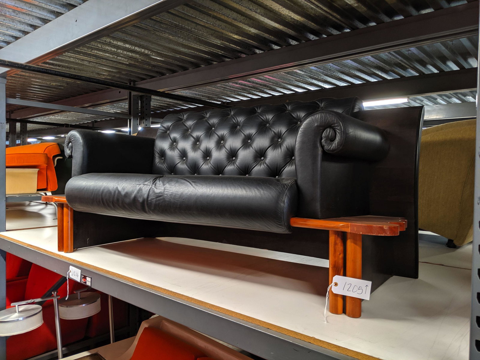Post Modern Loveseat: Post Modern loveseat with wood sculpted front and back.