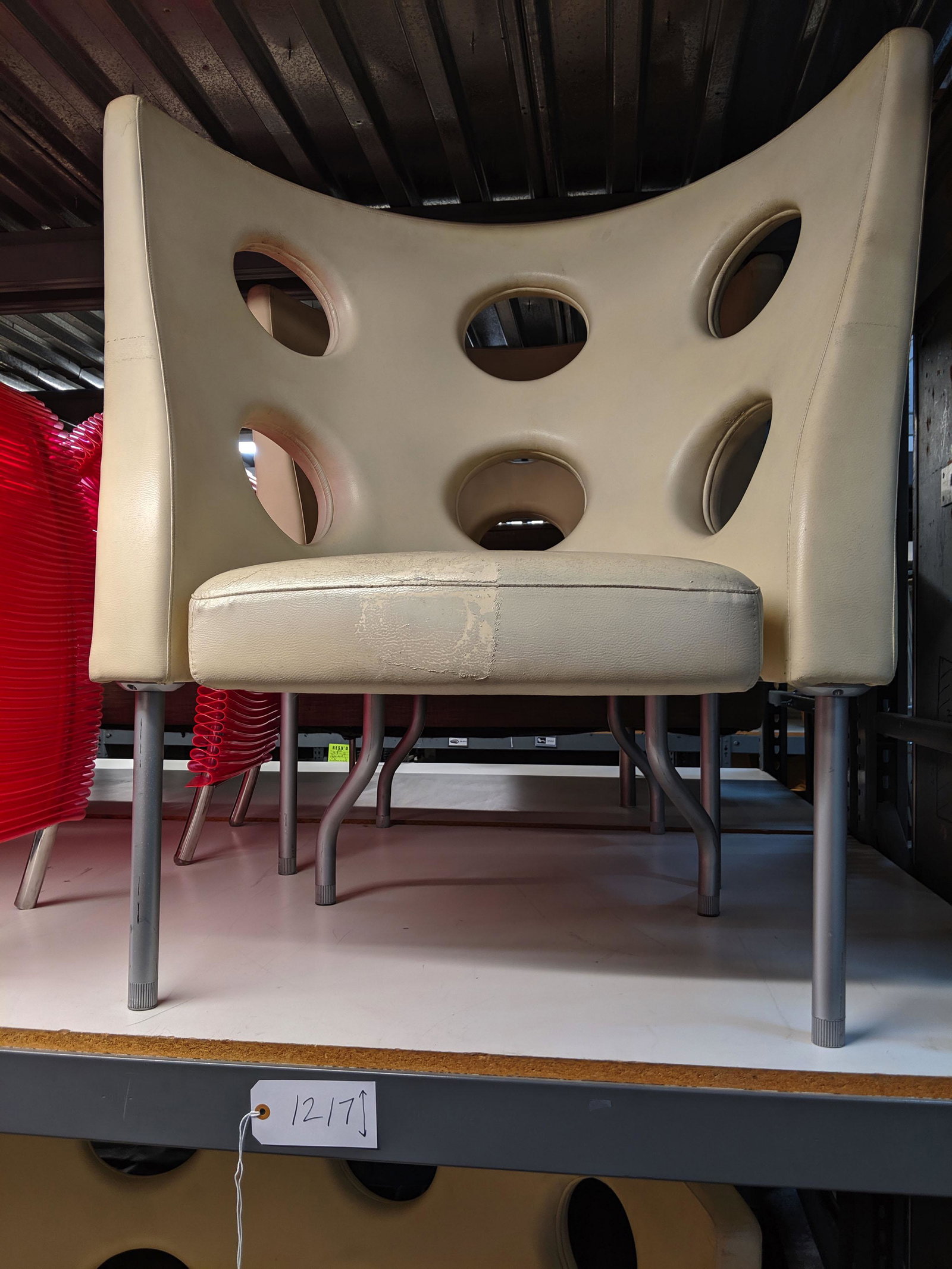 Port Hole Seating Set: Cream vinyl seating set with one loveseat and two chairs.